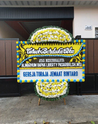 Papan Bunga Duka di Pengkol